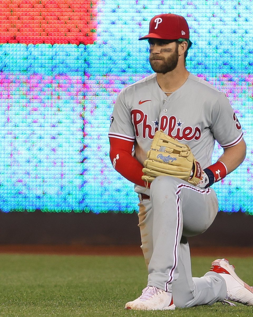 Bryce Harper kneeling in pregame warm-up